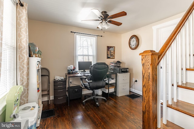 office with ceiling fan and dark wood-type flooring