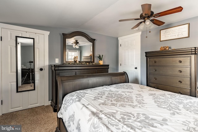 bedroom with ceiling fan, light carpet, and lofted ceiling