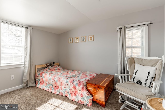 bedroom with carpet and vaulted ceiling