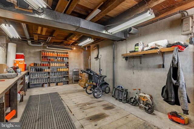 basement with a workshop area