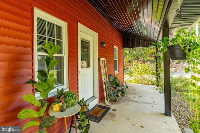 view of patio featuring a porch