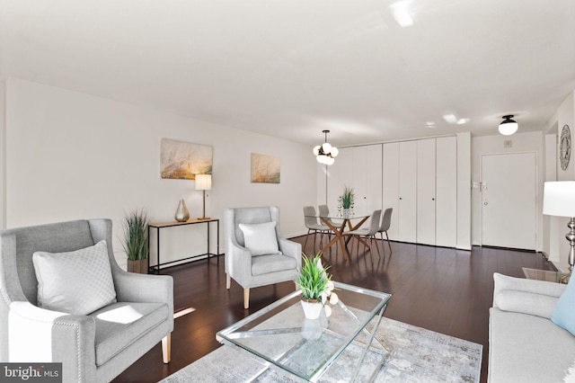 living room featuring dark hardwood / wood-style floors