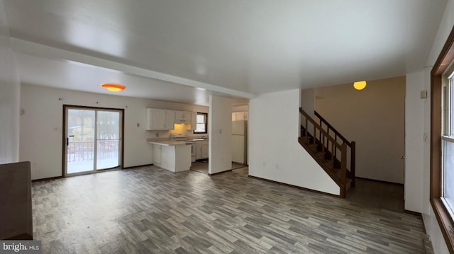 unfurnished living room featuring light hardwood / wood-style floors