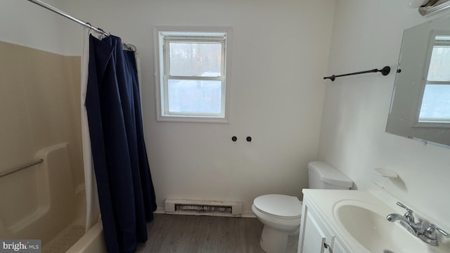 full bathroom with shower / bathtub combination with curtain, toilet, vanity, and hardwood / wood-style flooring