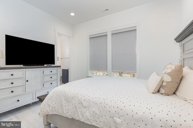 bedroom featuring light wood-type flooring