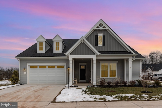 view of front of property with a garage