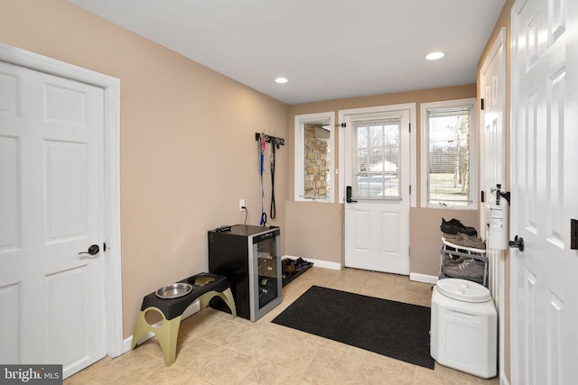 entrance foyer featuring light tile patterned flooring