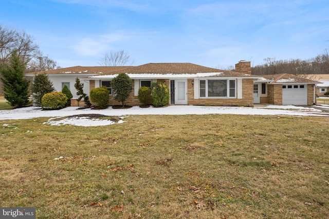 single story home featuring a garage and a front lawn