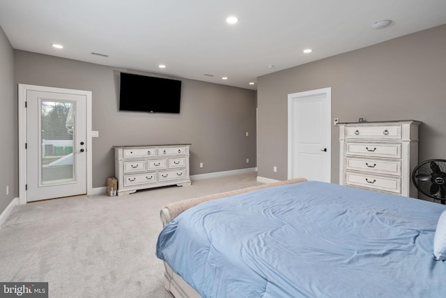 carpeted bedroom featuring access to exterior