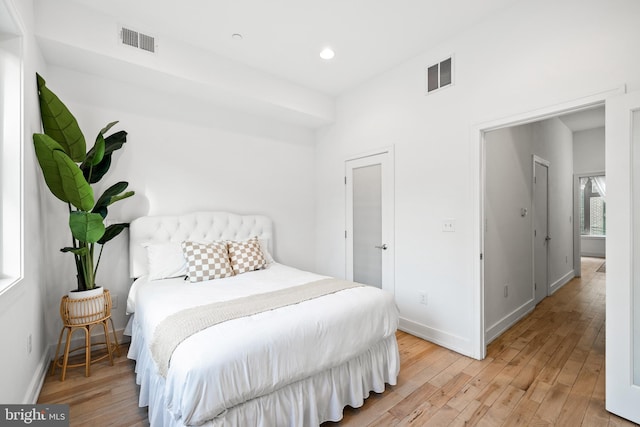 bedroom featuring light wood-type flooring