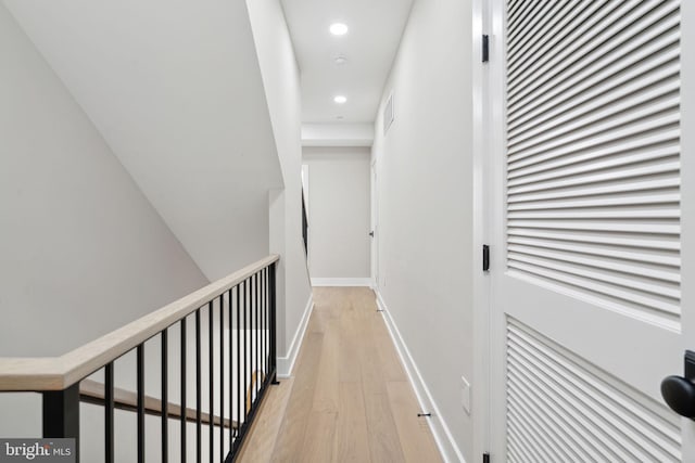 corridor featuring light hardwood / wood-style flooring