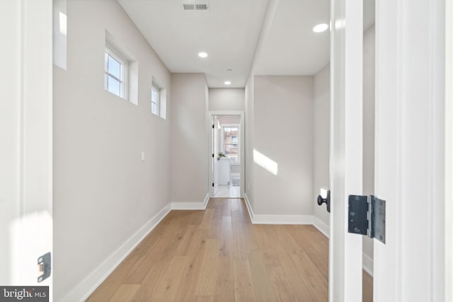 hallway featuring light wood-type flooring