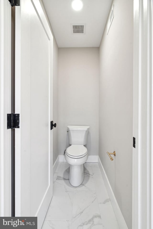 bathroom featuring toilet