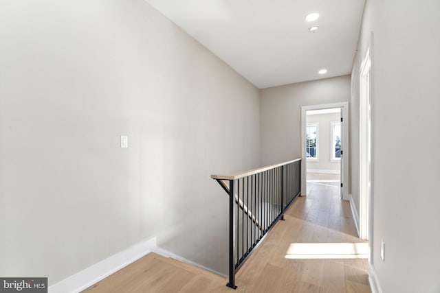 hall with light wood-type flooring