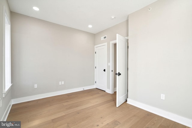 unfurnished bedroom with light hardwood / wood-style floors