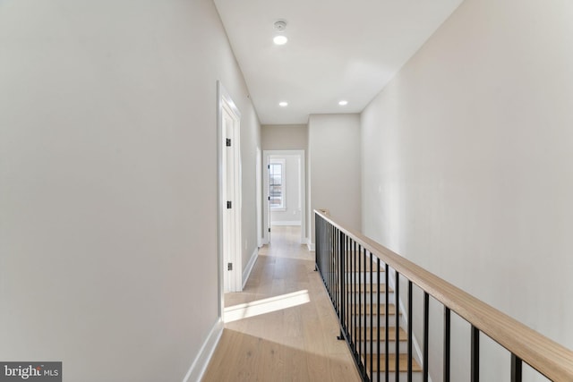 hall with light wood-type flooring