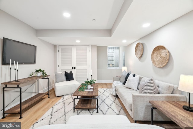 living room with light hardwood / wood-style floors