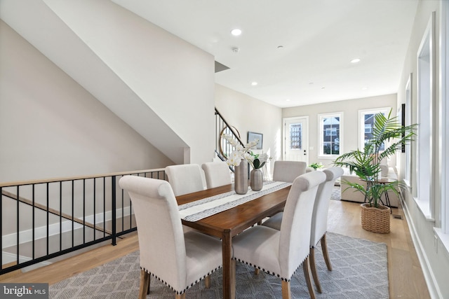 dining area featuring light wood-type flooring