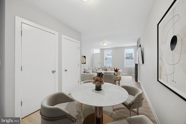 dining room with light wood-type flooring