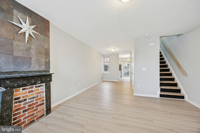 unfurnished living room with light hardwood / wood-style floors