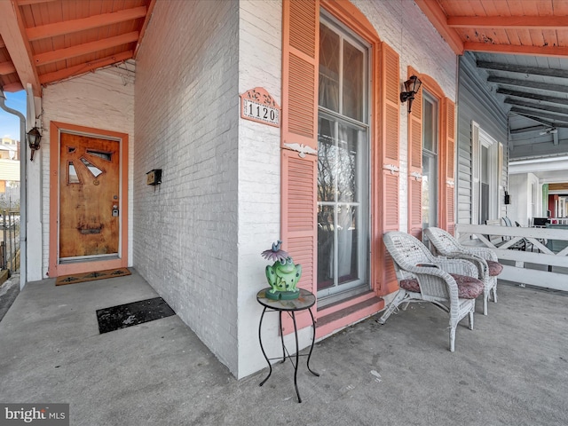 property entrance with a porch