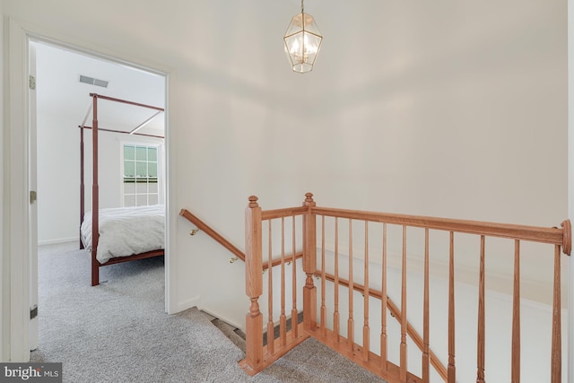 stairs with carpet floors