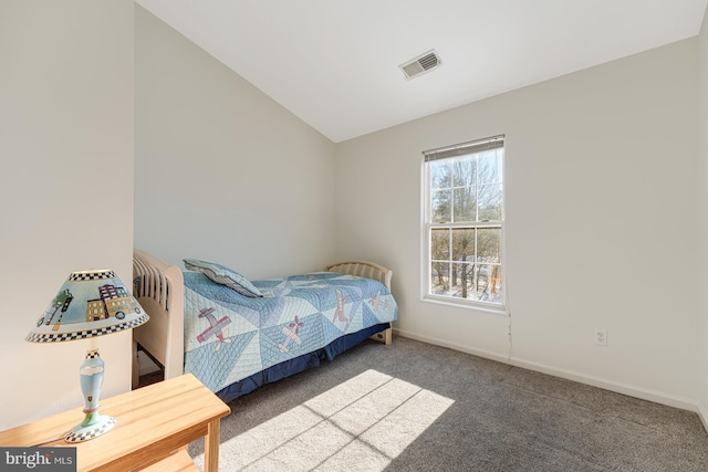 carpeted bedroom featuring vaulted ceiling