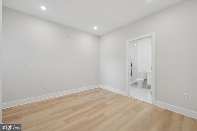 unfurnished room featuring light hardwood / wood-style floors