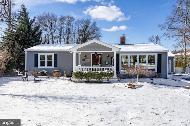 view of front of property featuring covered porch