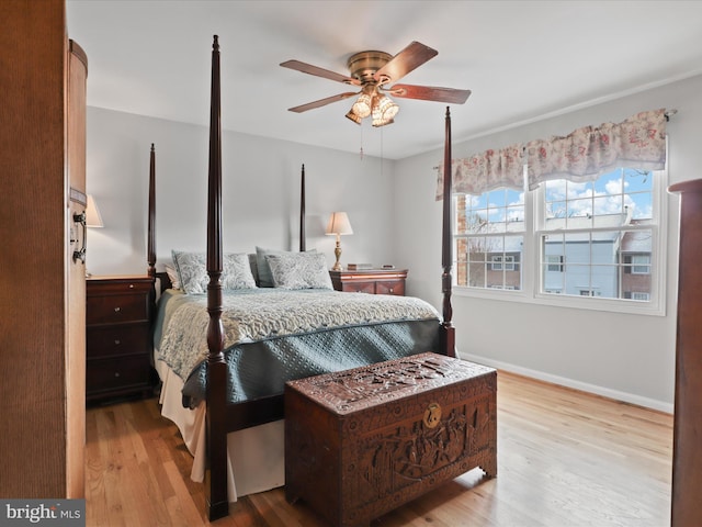 bedroom featuring ceiling fan and light hardwood / wood-style floors