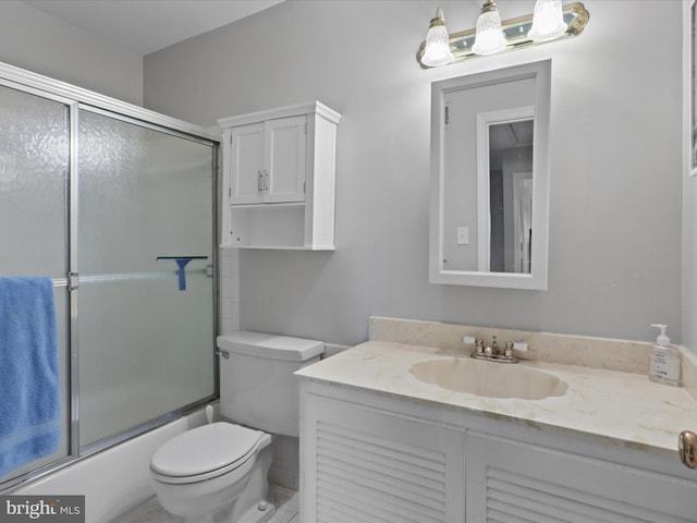 full bathroom featuring vanity, toilet, and enclosed tub / shower combo