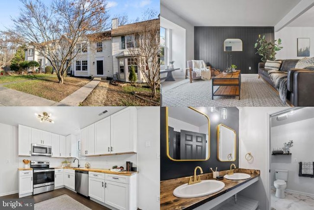 interior space featuring sink, white cabinets, and stainless steel appliances