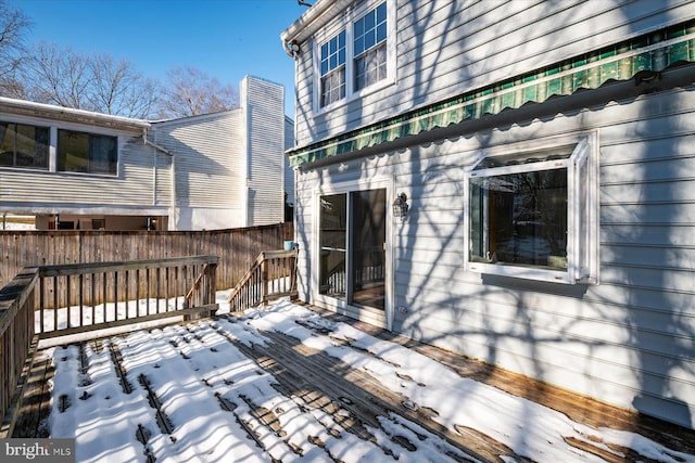 view of snow covered deck