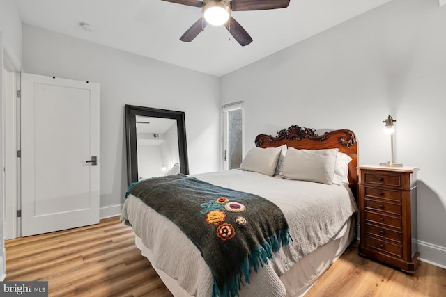 bedroom featuring ceiling fan and hardwood / wood-style floors