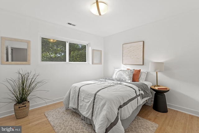 bedroom featuring light hardwood / wood-style floors