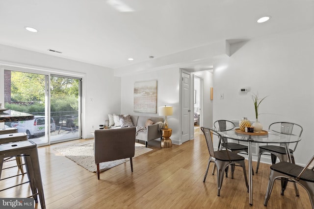 dining room featuring light hardwood / wood-style floors