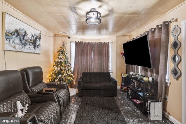 living room featuring crown molding