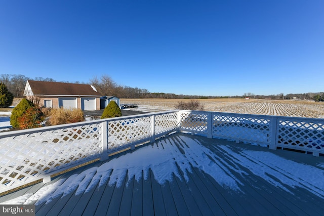 wooden terrace with a rural view