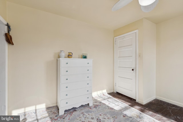 unfurnished bedroom featuring ceiling fan