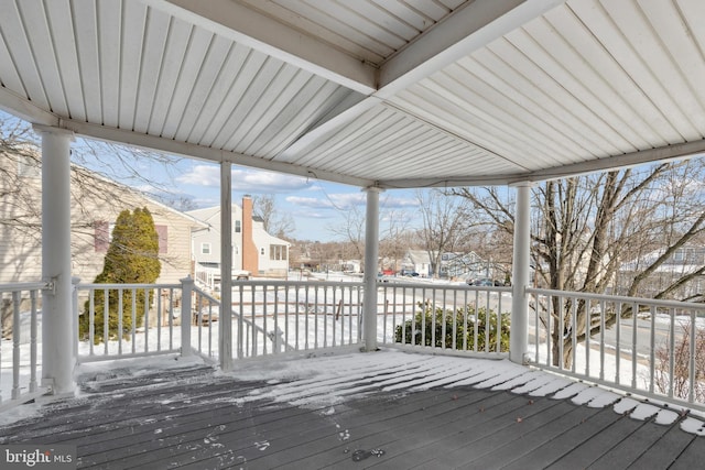 view of snow covered deck