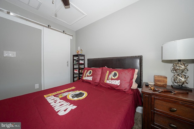 bedroom featuring ceiling fan and carpet