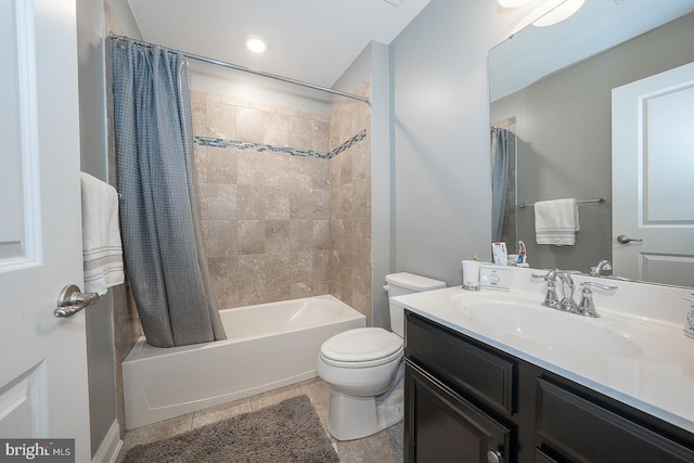 full bathroom with tile patterned floors, vanity, toilet, and shower / tub combo with curtain