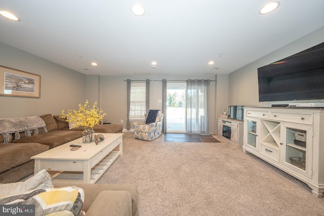 living room with light colored carpet