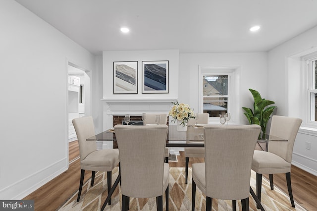 dining area with wood-type flooring