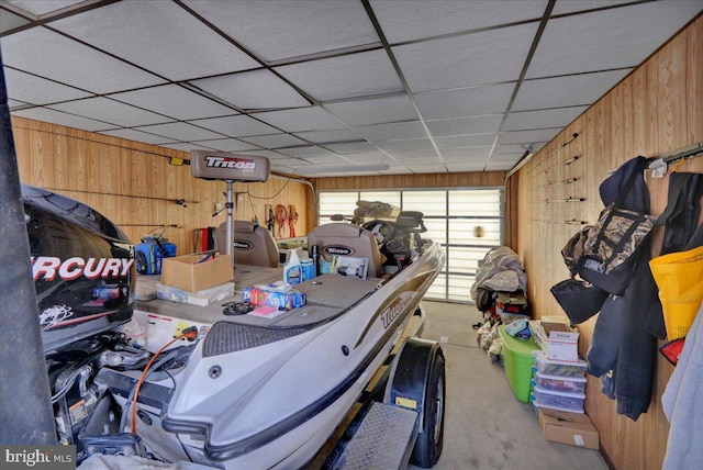 garage with wood walls