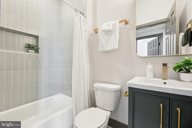 full bathroom with vanity, shower / bath combination with curtain, and toilet