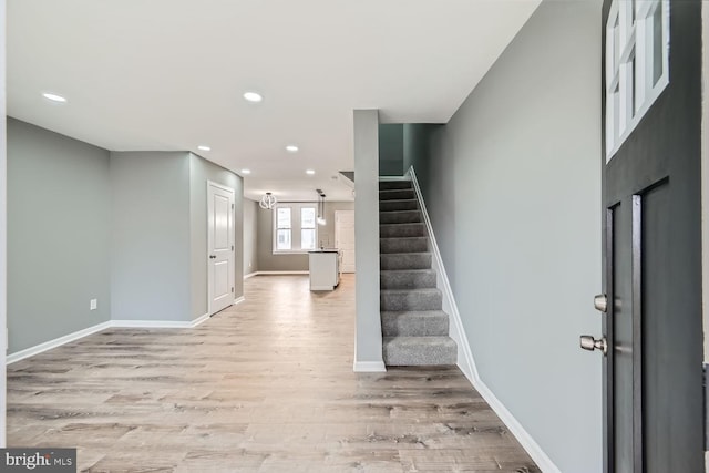 entrance foyer with light hardwood / wood-style floors