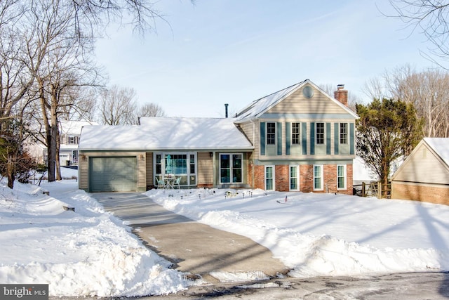 view of front of property featuring a garage