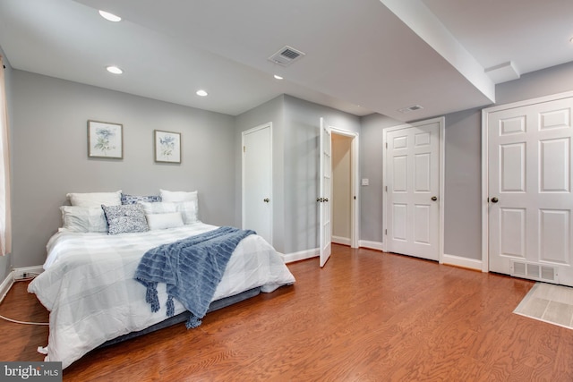 bedroom featuring hardwood / wood-style flooring