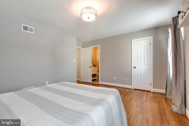 bedroom featuring light wood-type flooring